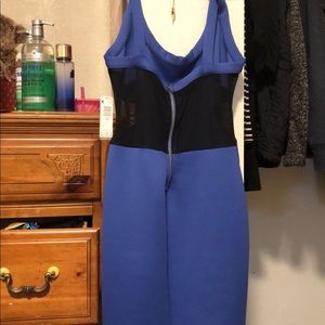 Beautiful brand new dress with a see threw back!